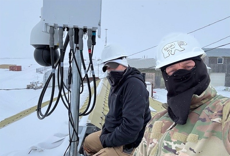 members of the national guard pose with Shishmaref ATN installation equipment